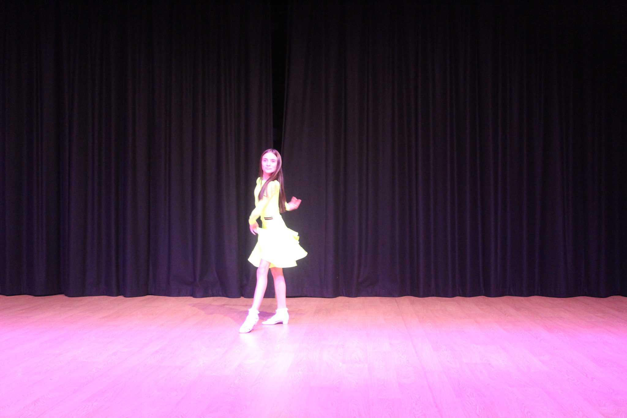 A student performs in Didsbury High School Free to Fly Dance Showcase 2023.