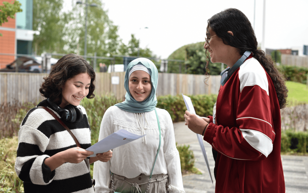 3 students from Didsbury High School open their GCSE results together